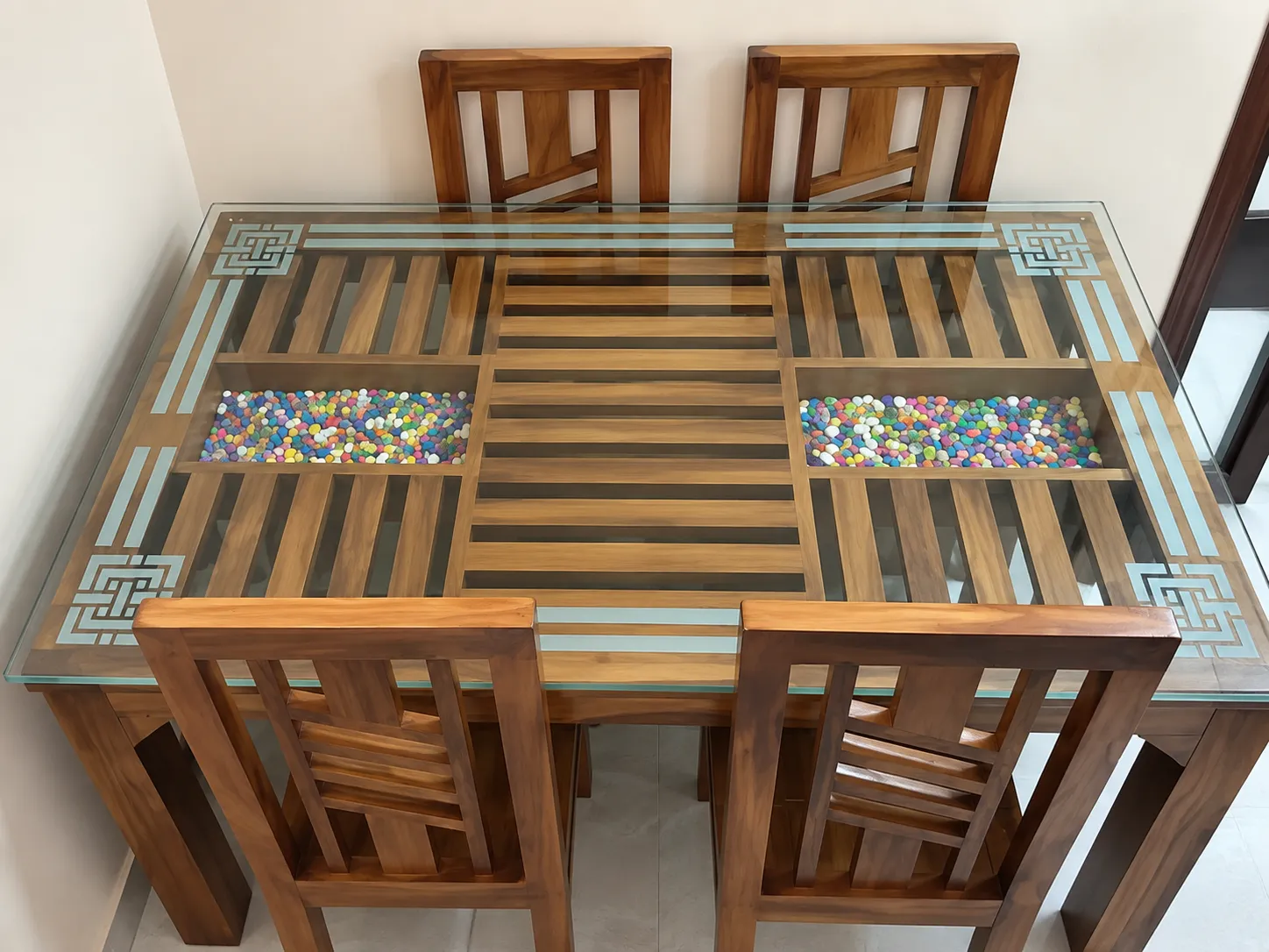 Kallingal Artisan Royal Dining Table 12 - Brass Inlay Teak Dining Set Kallingal hand-sculpted royal Nilambur teak dining table with brass inlay and carved apron